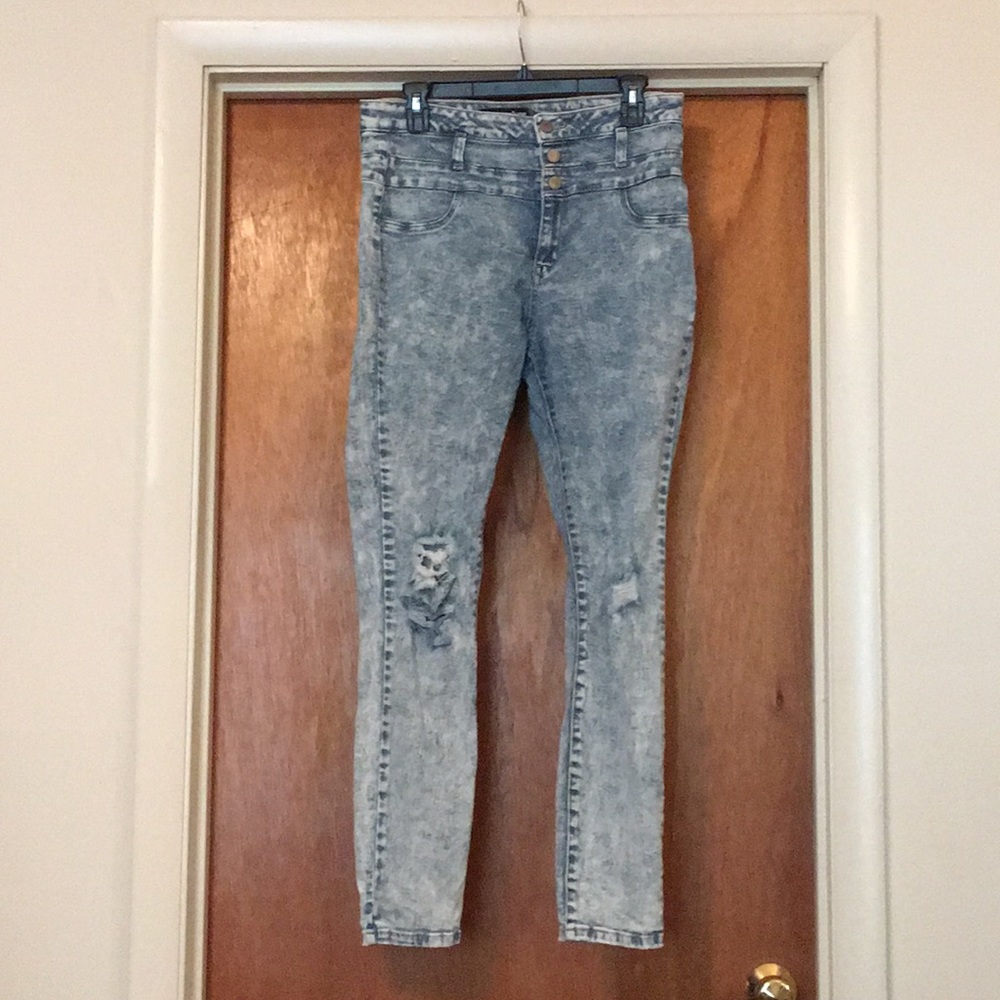 Distressed acid washed jeans